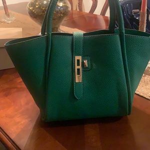 Green casual bag barley used leather .